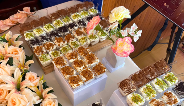 TIRAVIE pastry spread styled with flowers